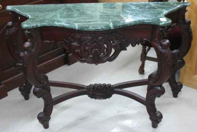 Appraisal: ROCOCO STYLE CONSOLE TABLE th century of carved mahogany with