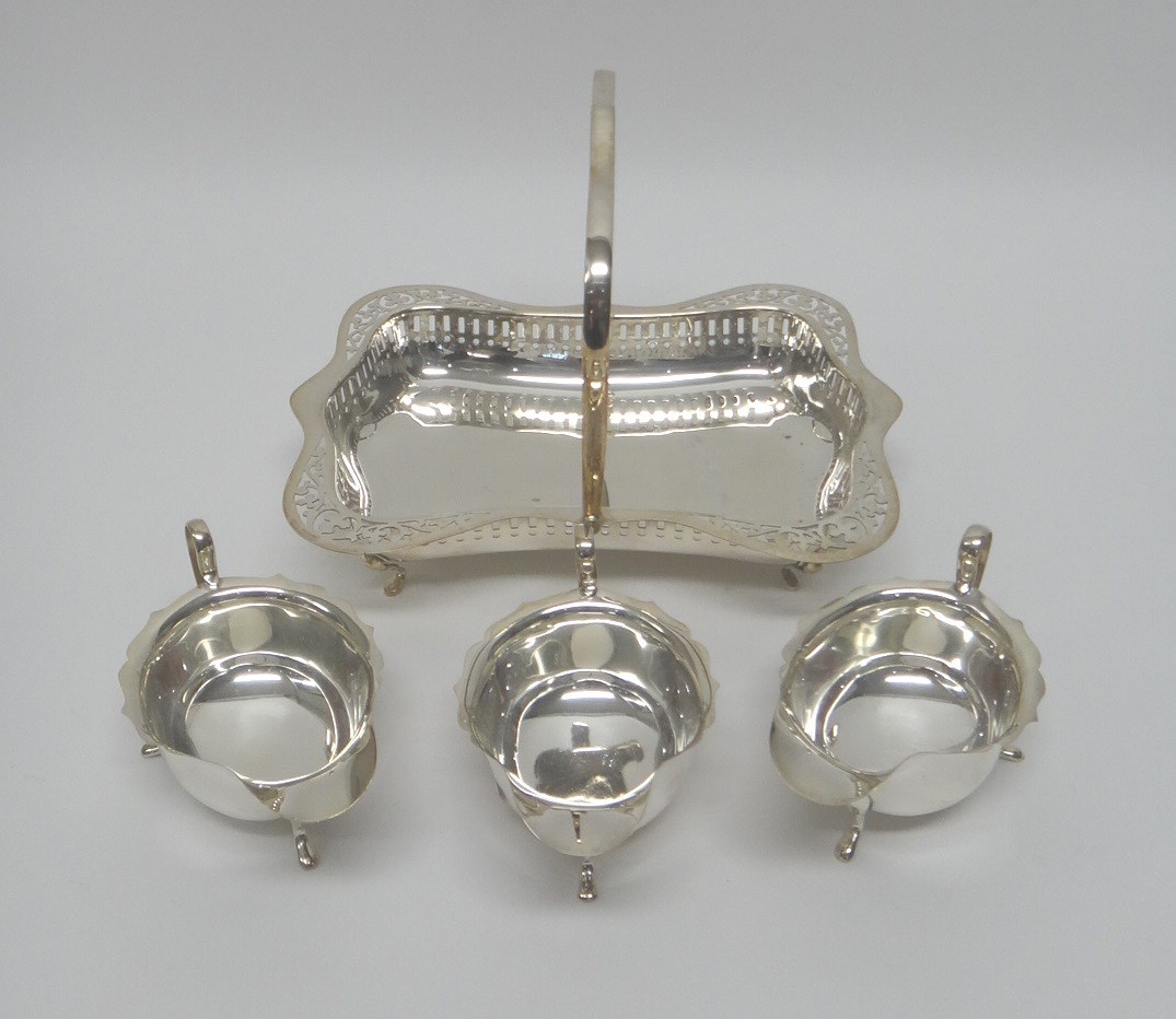 Appraisal: Three similar silver sauceboats each with a wavy rim and