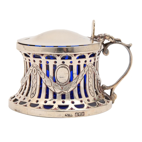 Appraisal: An Irish Edwardian pierced SILVER mustard pot in the form