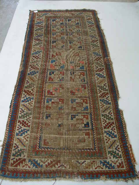 Appraisal: Antique Caucasian Runner red blue green and yellow geometric patterns