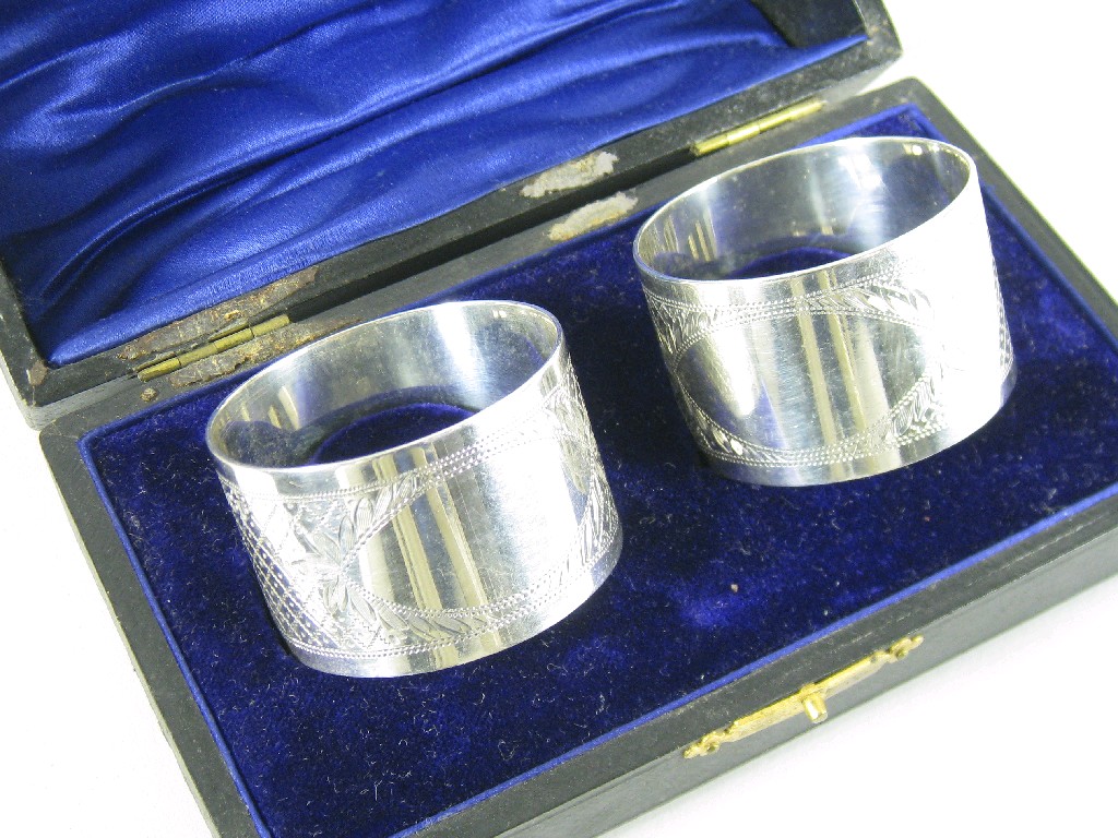 Appraisal: Pair of Napkin Rings etched with criss-cross pattern each with