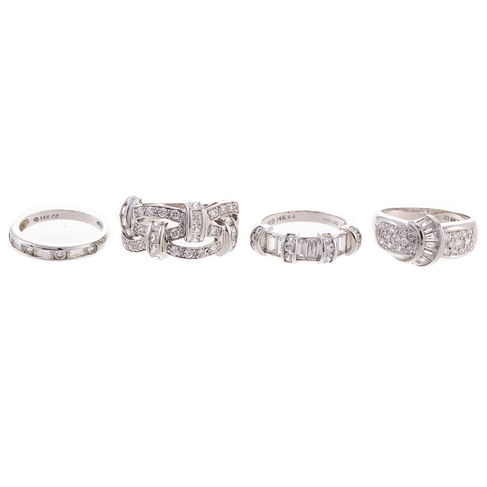 Appraisal: A Collection of White Gold CZ Decorative Rings Four white