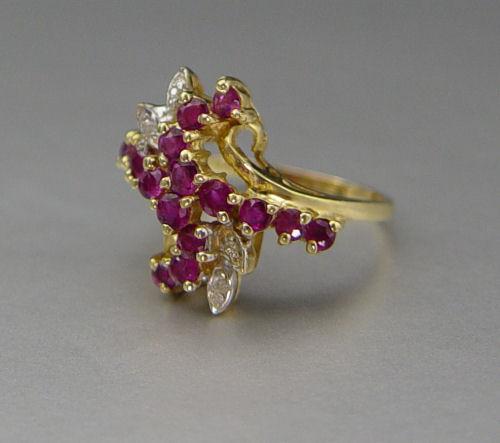 Appraisal: K RUBY DIAMOND RING K yellow gold ring contains sixteen