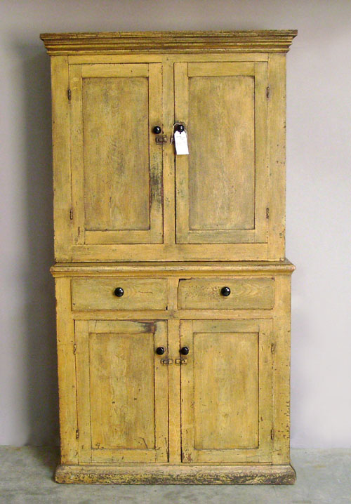 Appraisal: Grain painted two part wall cupboard th c h w