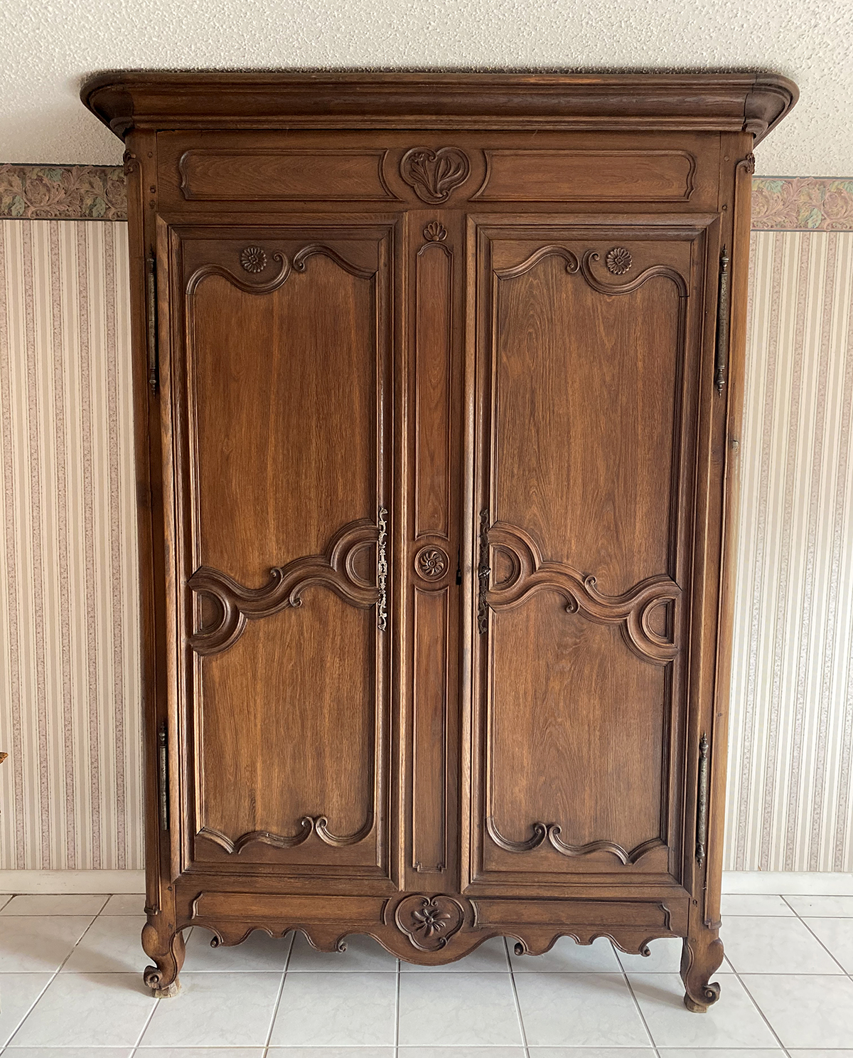 Appraisal: LARGE TH C CARVED FRENCH WALNUT DOOR ARMOIRE A fine