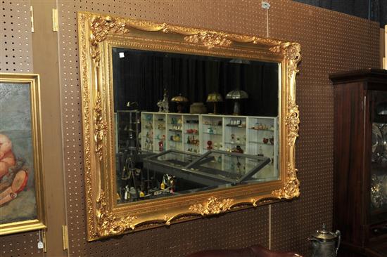 Appraisal: CONTEMPORARY MIRROR Large beveled mirror in a gilt carved frame