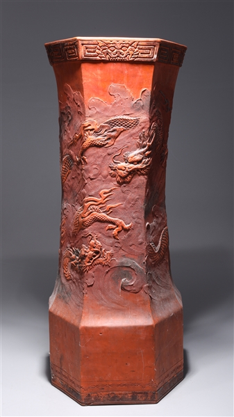 Appraisal: Chinese metal imitating cinnabar umbrella stand with dragons to body