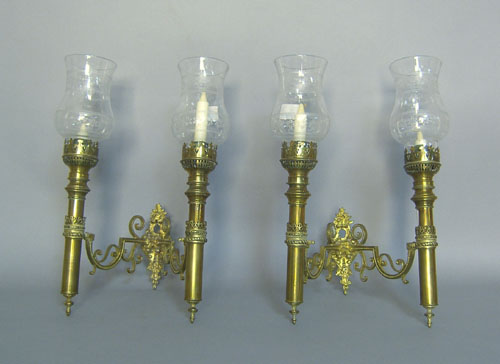 Appraisal: Pair of brass double arm wall sconces th c h