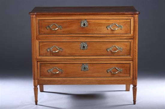 Appraisal: LOUIS XVI PROVINCIAL WALNUT COMMODE early th century Extended round-corner