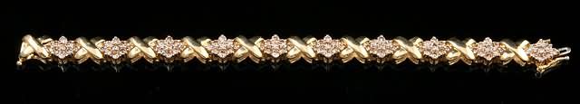 Appraisal: KY long Gold X links alternating with clusters of diamonds