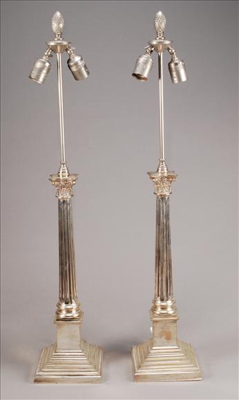 Appraisal: A pair of silver plated metal columnar table lamps last