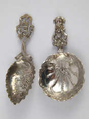 Appraisal: Two Dutch silver large caddy spoons one a shell with