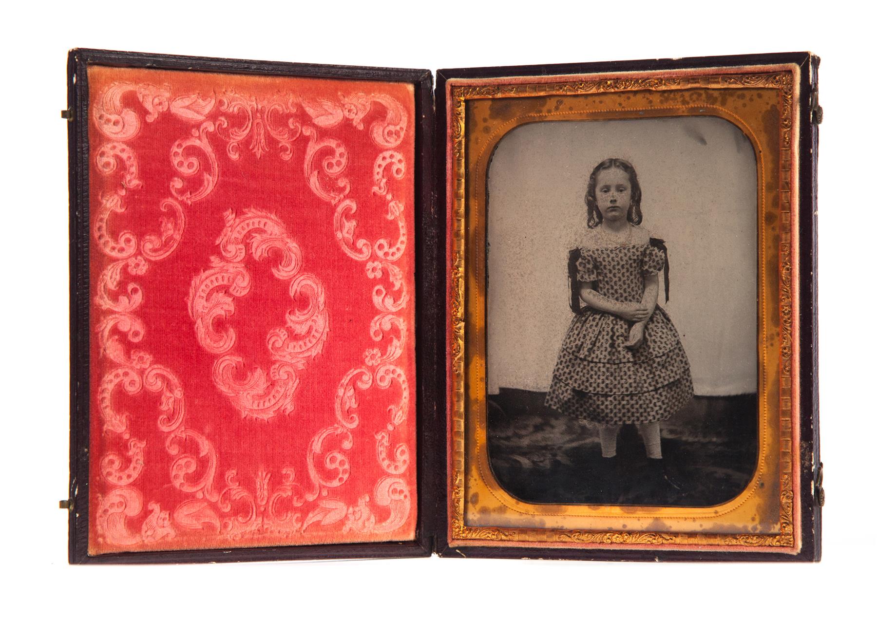 Appraisal: CASED HALF PLATE AMBROTYPE OF A YOUNG GIRL American mid