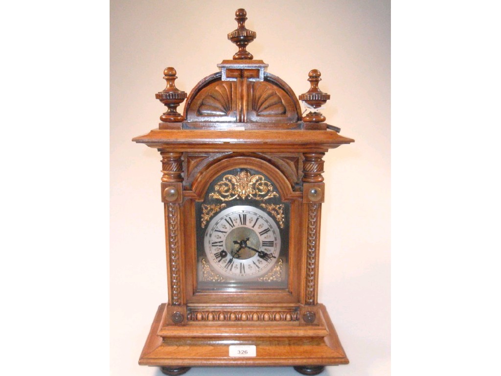 Appraisal: An early thC oak cased mantel clock by Junghans Germany