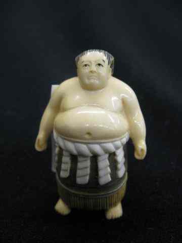 Appraisal: Carved Ivory Netsuke of a Sumo Wrestler colorful polychrome signed