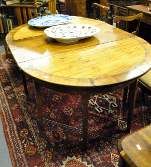 Appraisal: A Georgian mahogany and cross-banded D-end dining table on square