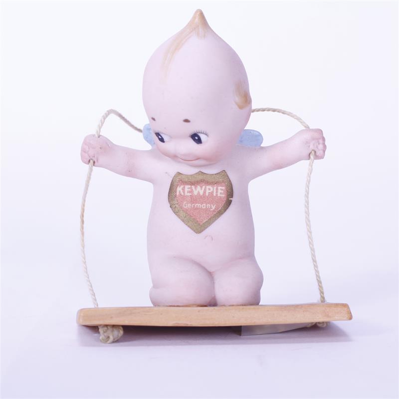 Appraisal: Rose O'Neill German Bisque action Kewpie Doll figure Kneeling on