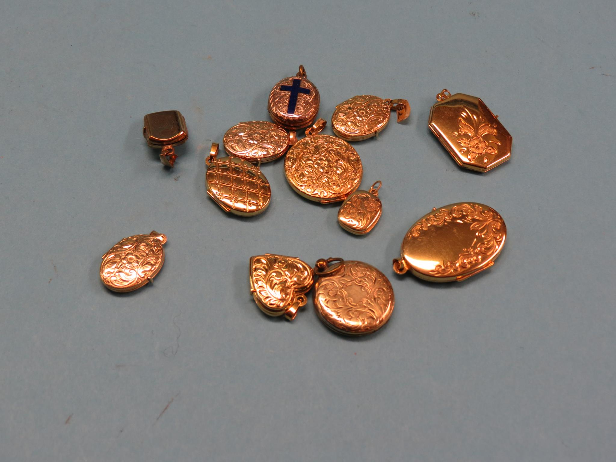 Appraisal: Twelve various ct gold yellow metal lockets grams gross total