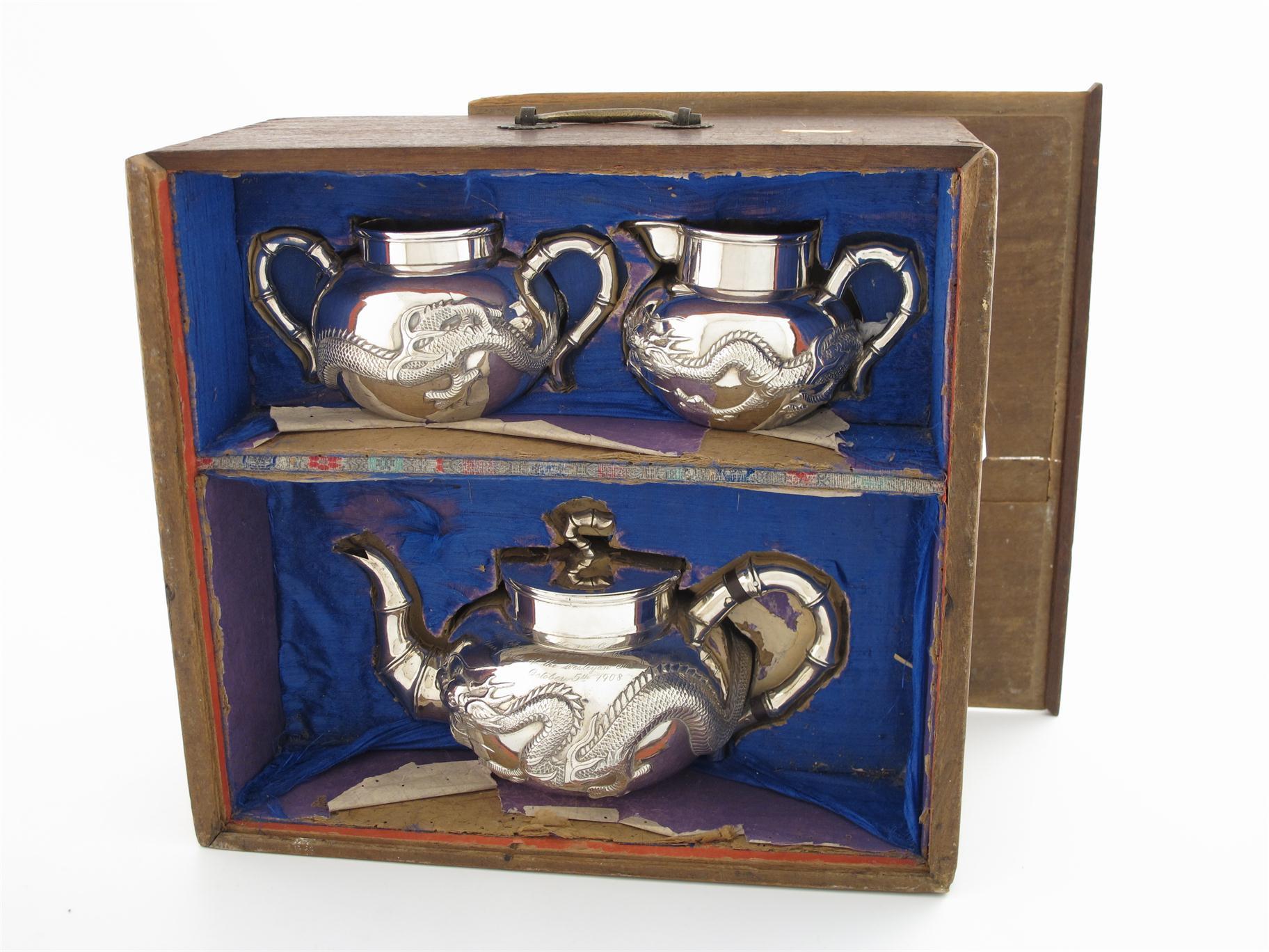 Appraisal: A three-piece Chinese silver tea set