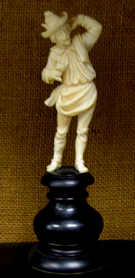 Appraisal: CARVED IVORY TYROLEAN PEASANT FIGURE Standing with wine goblet raised