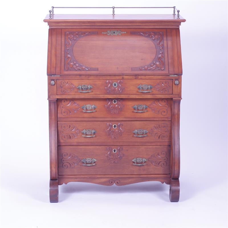 Appraisal: American Classical Empire slant front secretary bureau with decorative carving