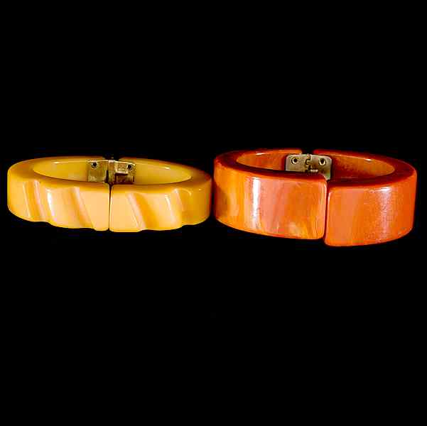 Appraisal: Pair of Structured and Carved Bakelite Bracelets A pair of