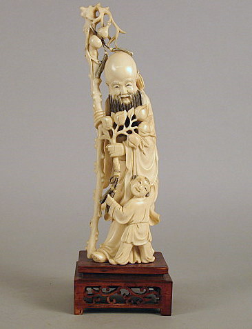 Appraisal: Chinese elephant ivory figure late th century Of tall figural