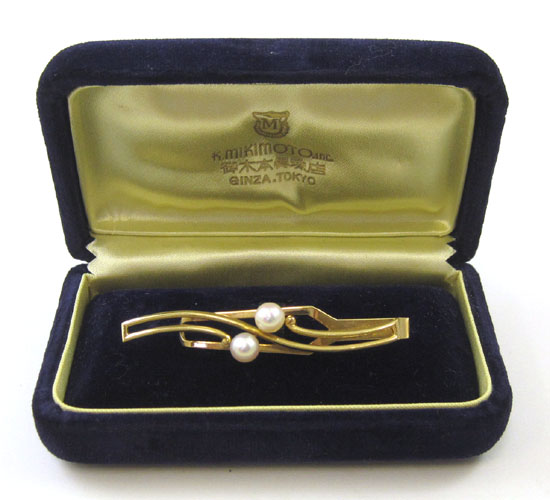 Appraisal: MIKIMOTO PEARL AND FOURTEEN KARAT GOLD TIE CLIP with original