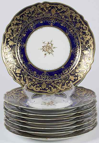 Appraisal: Nippon Plates Japanese eight hand-painted dinner plates with a scalloped