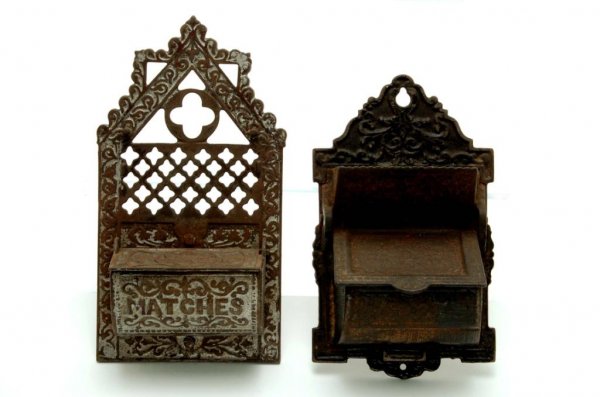 Appraisal: Two cast iron wall match safes box form with hinged