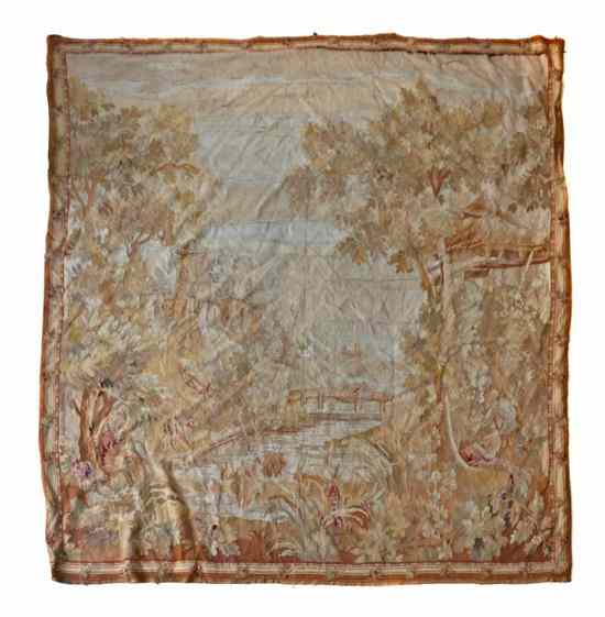 Appraisal: A Continental Wool Tapestry depicting a house overlooking a forest