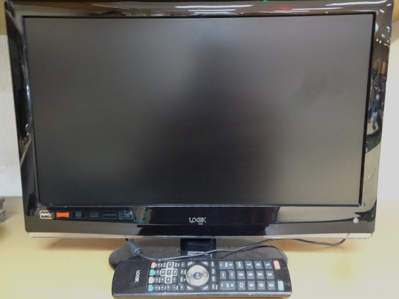 Appraisal: A Logik colour television with DVD and freeview features with