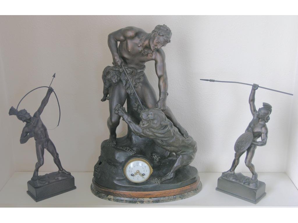 Appraisal: A late th Century bronzed spelter mantel clock after Thomas