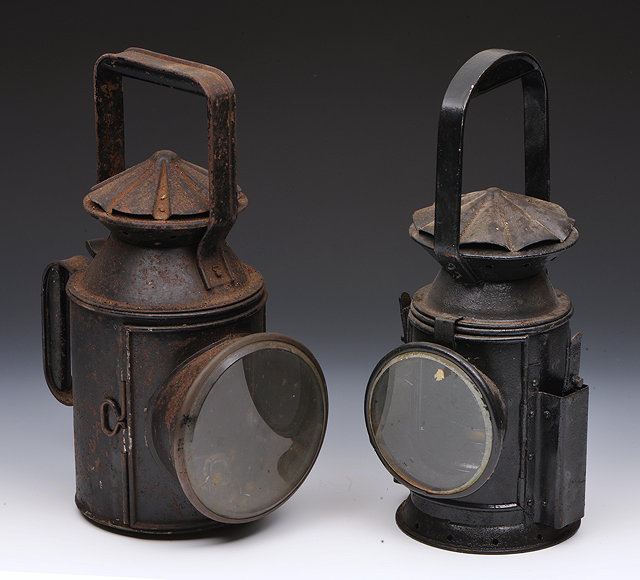 Appraisal: A BLACK PAINTED GUARD'S LAMP possibly military dated high together