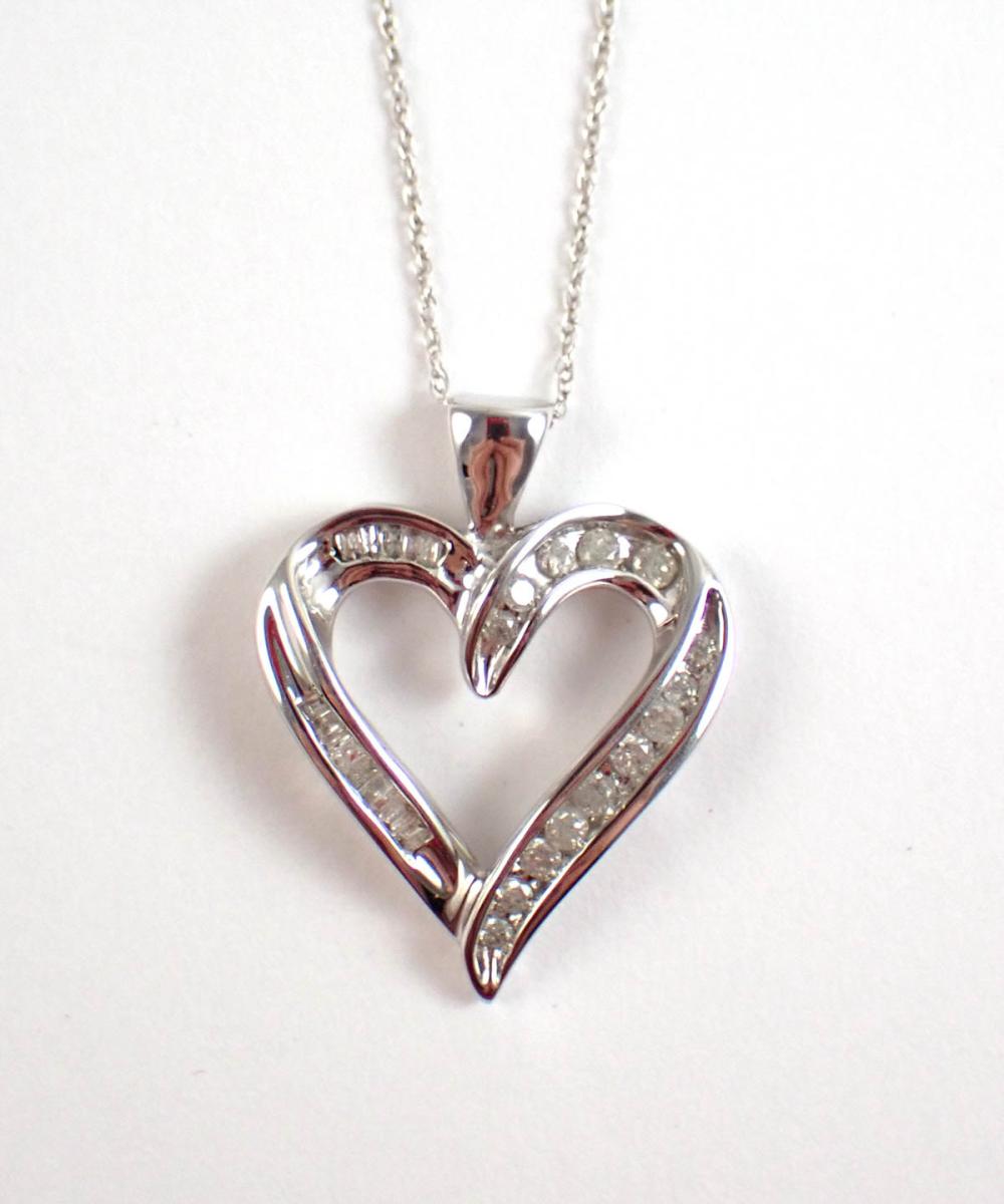 Appraisal: OPEN HEART PENDANT AND WHITE GOLD PENDANT NECKLACE with an