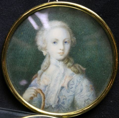 Appraisal: A circular portrait miniature of a lady damage cm diameter