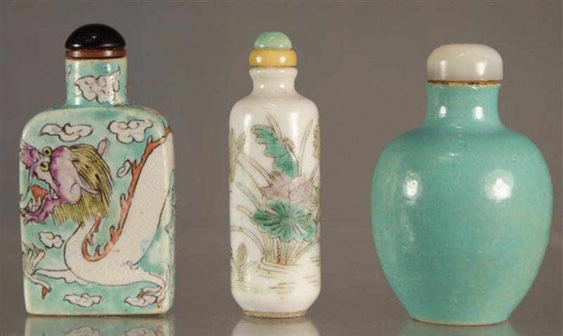 Appraisal: porcelain snuff bottles with enameled dragon landscape decoration monochrome turquoise