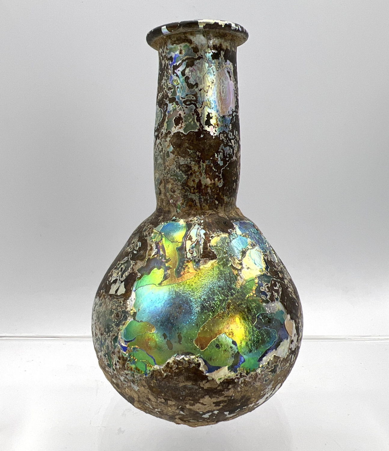 Appraisal: Iridescent bulbous vase Ancient Roman glass with flared rim Dimensions