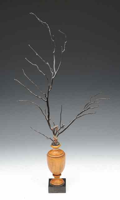 Appraisal: A SPRAY OF BLACK CORAL IN A TURNED FRUITWOOD URN