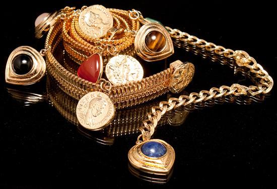 Appraisal: Judith Leiber gilt metal belt decorated with several charms containing