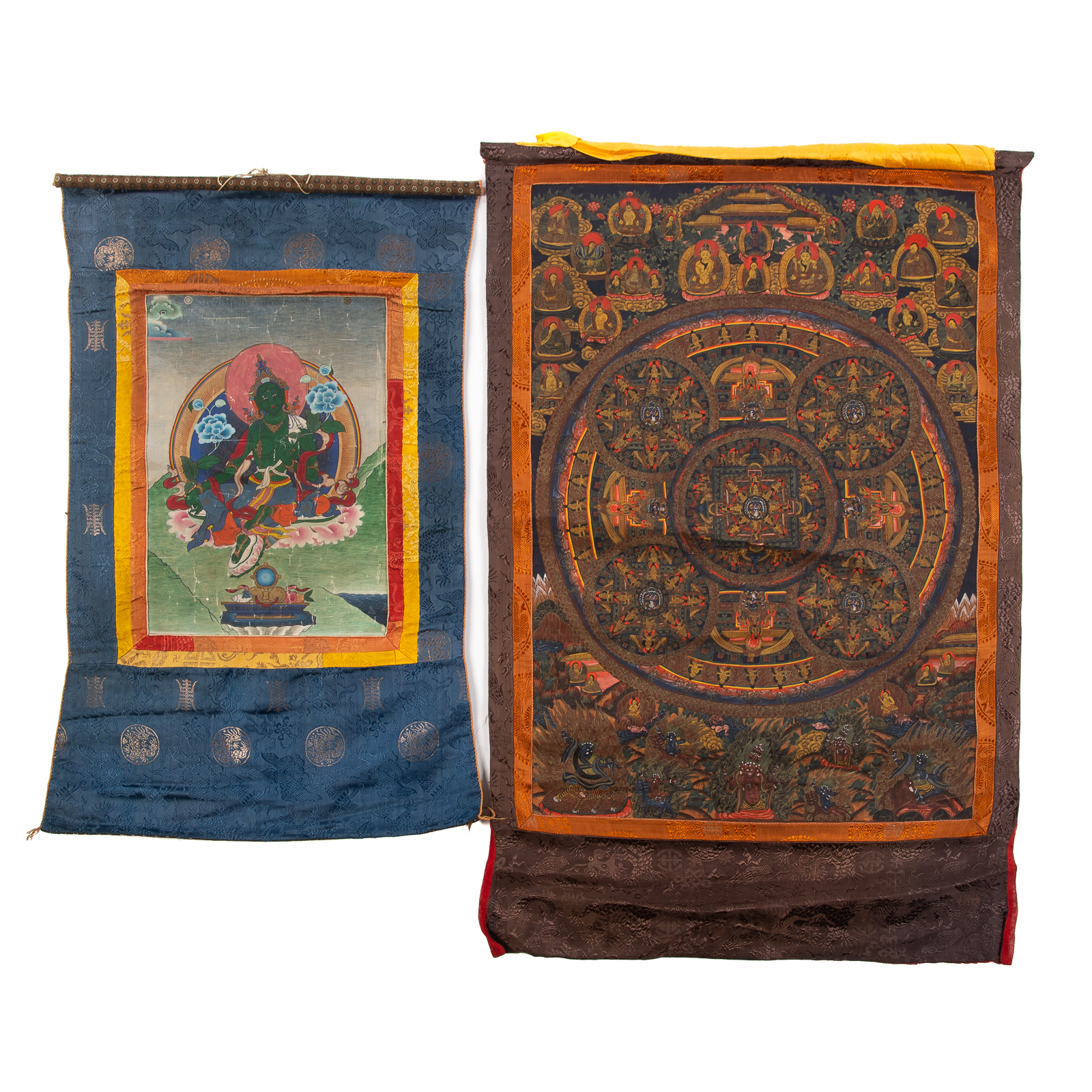 Appraisal: TWO TIBETAN THANGKA SCROLLS th century pigment on linen depicting