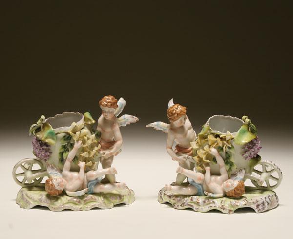 Appraisal: Pair of Continental hand painted and gilt porcelain figures two