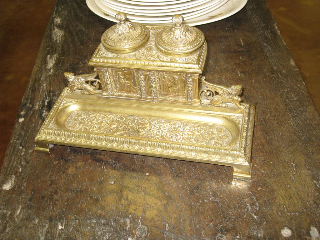 Appraisal: A brass Inkstand with hinged ink pots classical figure rosette