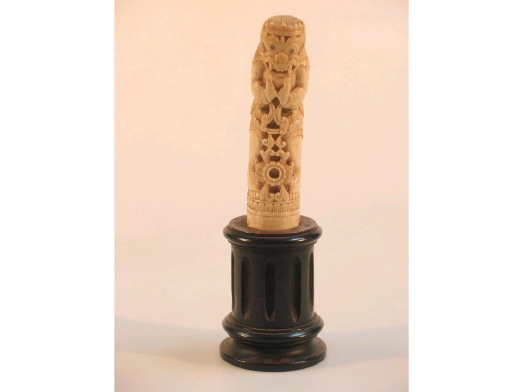 Appraisal: A Chinese carved ivory tusk figure of a temple dancer