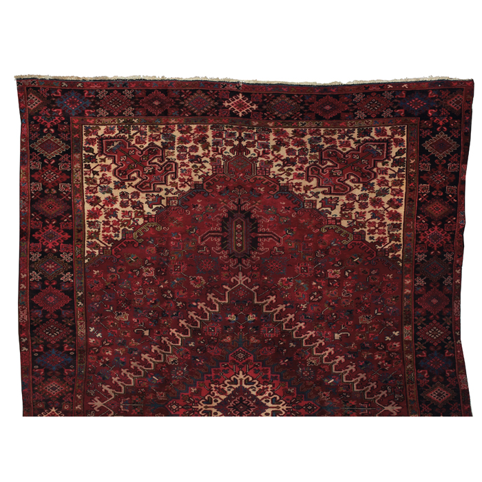 Appraisal: Heriz rug c stylized floral design on a red field