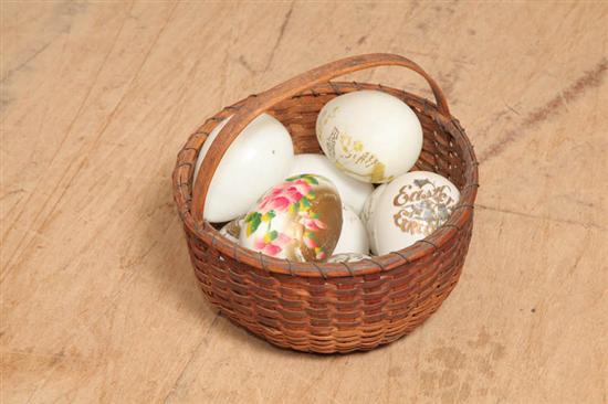 Appraisal: MILK GLASS EGGS AND BASKET Nine large eggs some with