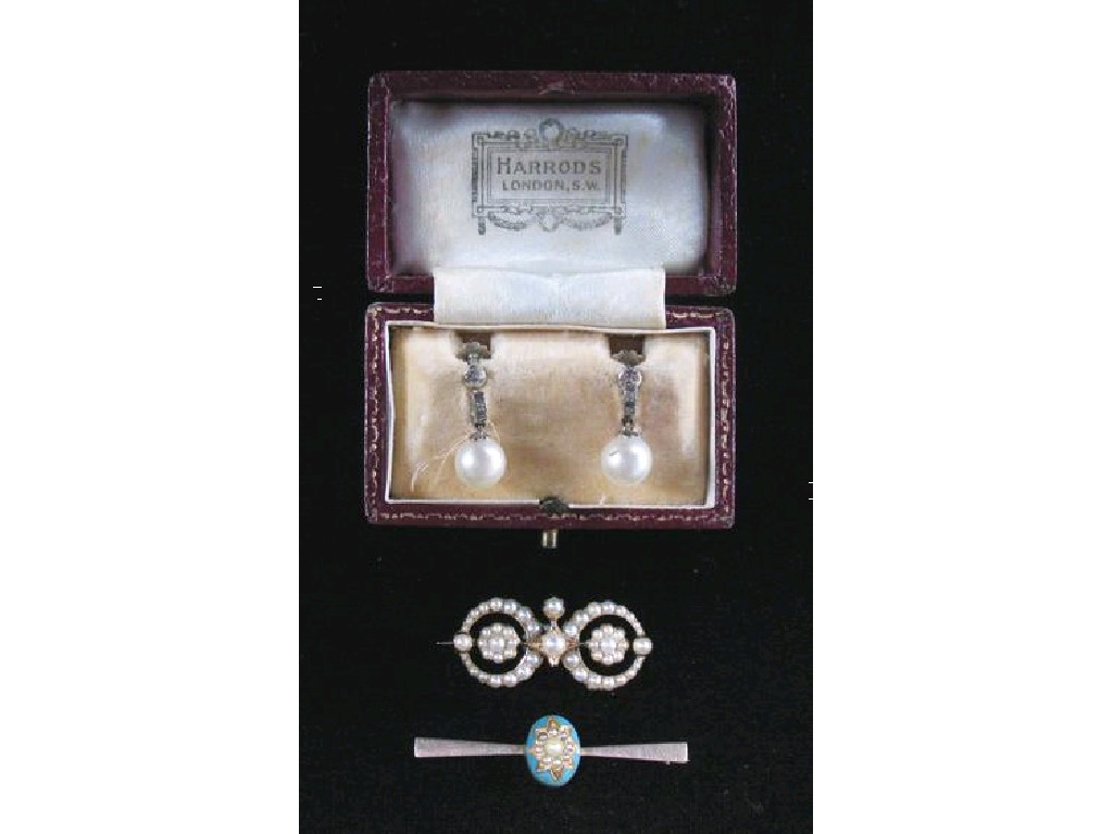 Appraisal: A VICTORIAN PEARL SET DOUBLE TARGET OPEN WORK BROOCH engraved