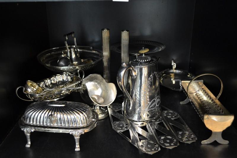 Appraisal: SHELF OF ASSORTED E P INCL STRACHAN CANDLEHOLDERS EXPANDABLE TRIVET