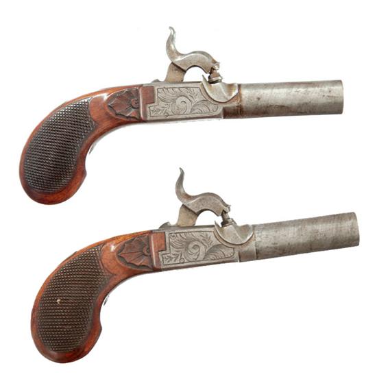 Appraisal: PAIR OF SCREW-BARREL POCKET PISTOLS European th century approximately caliber