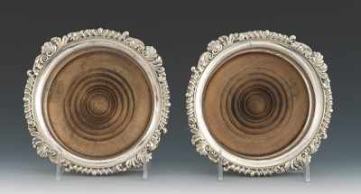 Appraisal: A Pair of Fine Sheffield Silver Plate Wine Coasters Circular